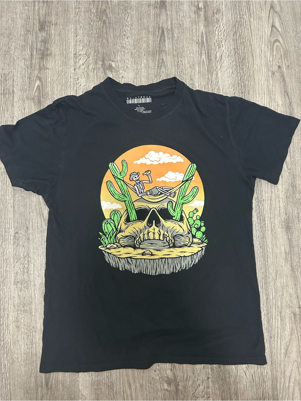 Dx-Xtreme Black Tee with Orange Sunset and Green Cactus Skull Graphic